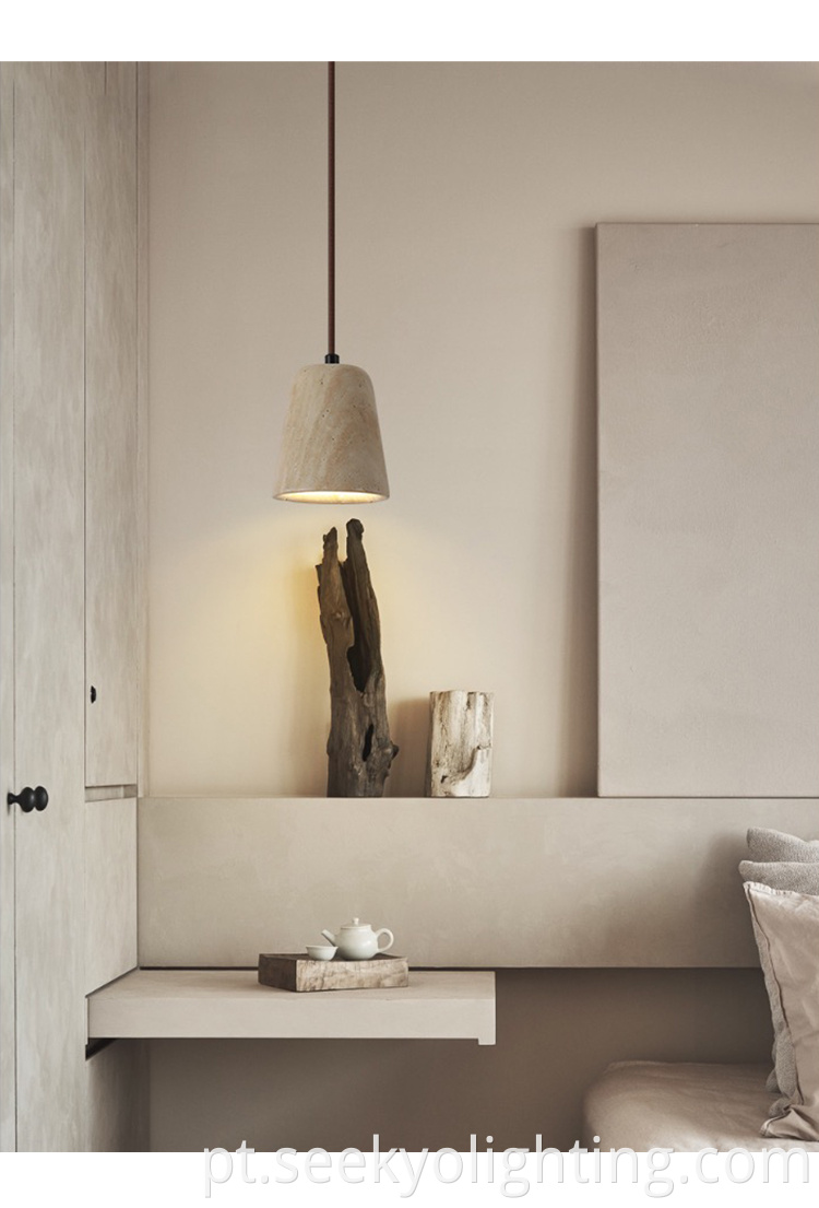 The glass stone pendant gives off a soft and diffused light, creating a warm and inviting atmosphere.